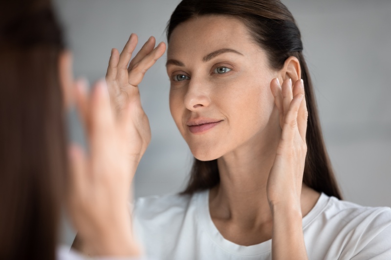 A picture of a happy healed skin of a girl from retinol damage