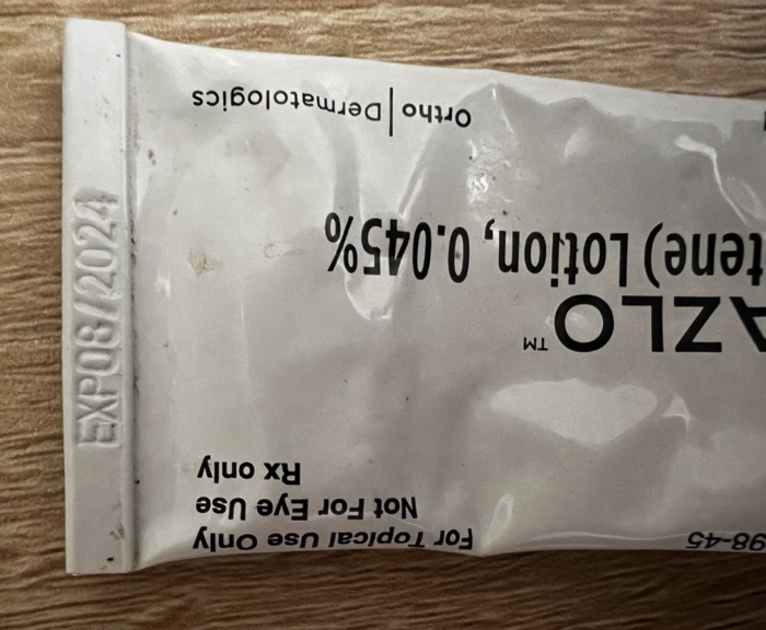 Picture showing expiration date on tube